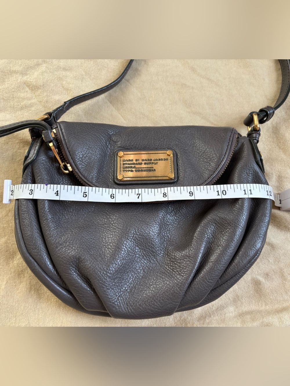 Marc by Marc Jacobs dark brown leather crossbody with gold plaque